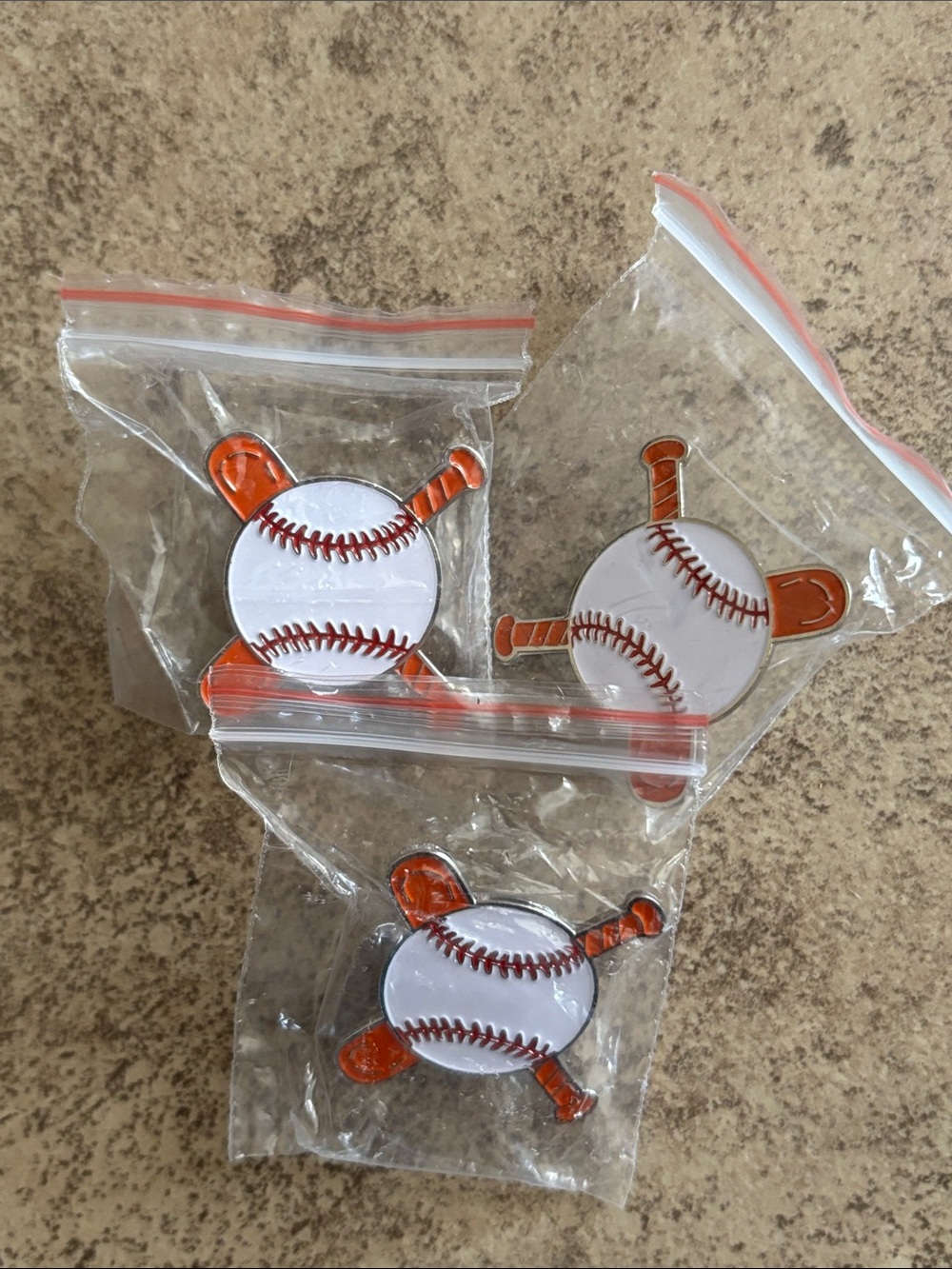 3 baseball pins